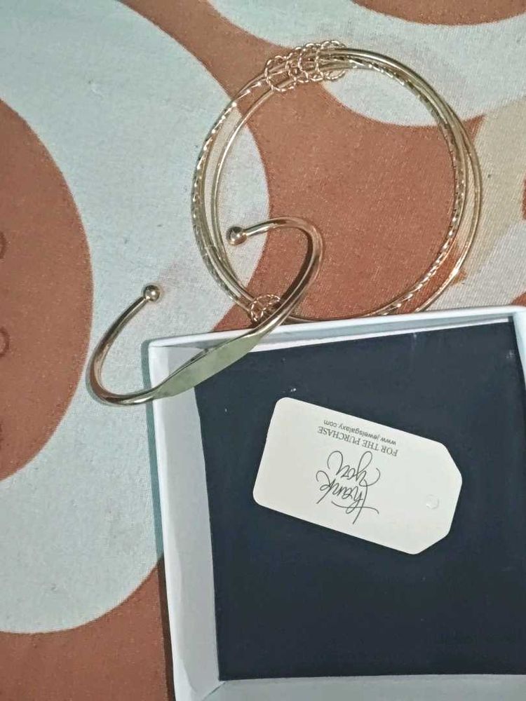 Elegant Gold Tone Bangle Set