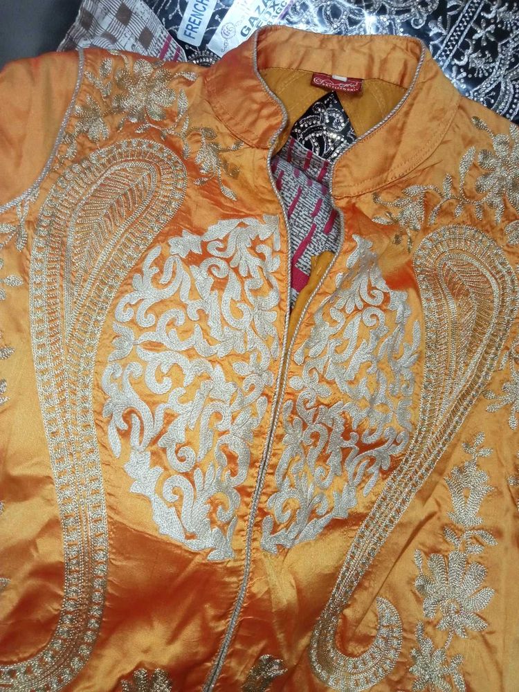 Elegant Orange Embroidered Kurta Set