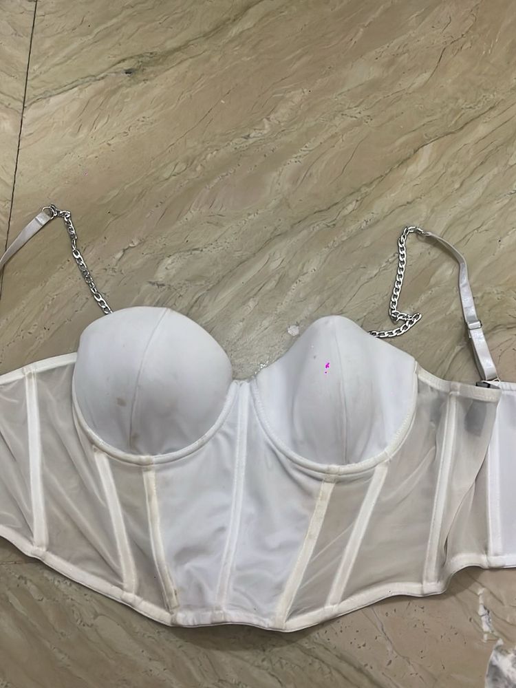 white corset top with silver chain detailing