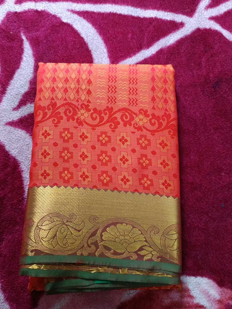 Beautiful Orange and Gold Silk Saree