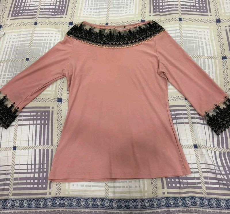 Elegant Pink Top with Black Lace Trim