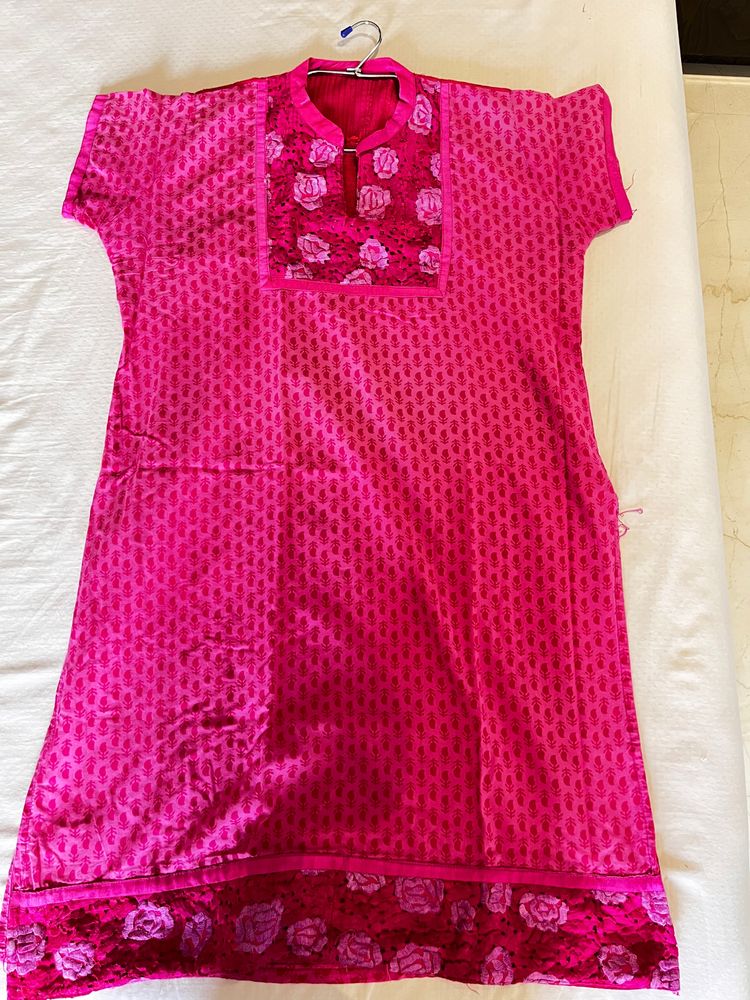 Vibrant Pink Kurti with Floral Accent