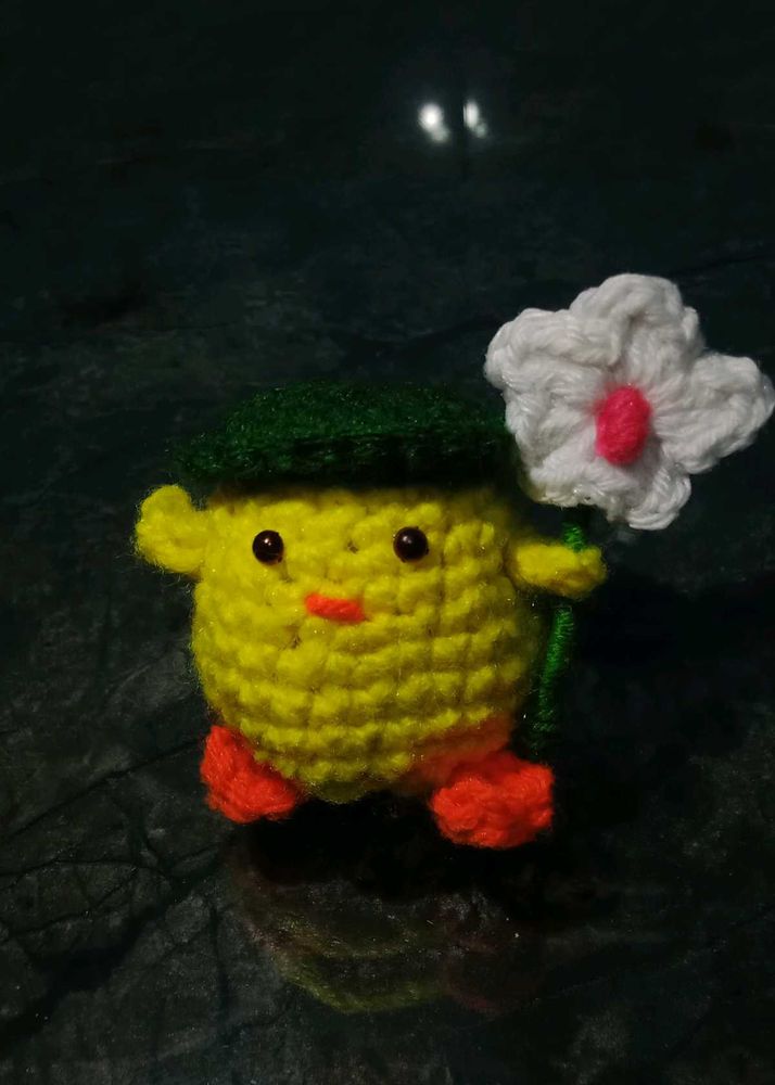 Handmade Crochet Toy with it's Flower