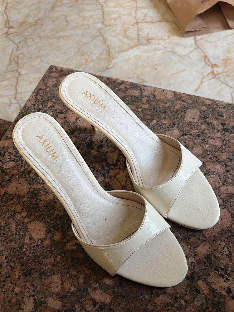 AXIUM Cream Heeled Mules