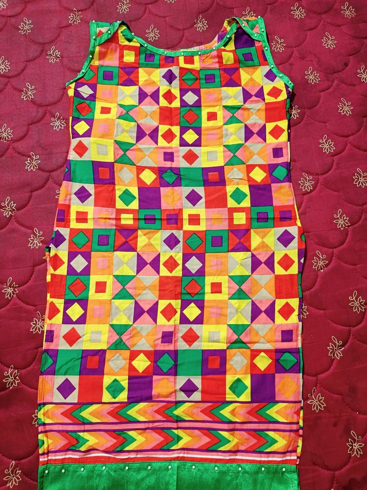Multi Coloured Cotton Kurti With Pearls Attached On The Neck And Bottom Part.