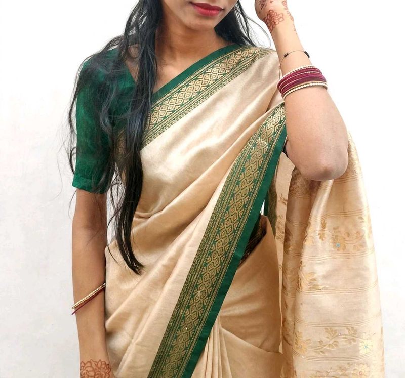 Elegant Beige Saree with Green Border