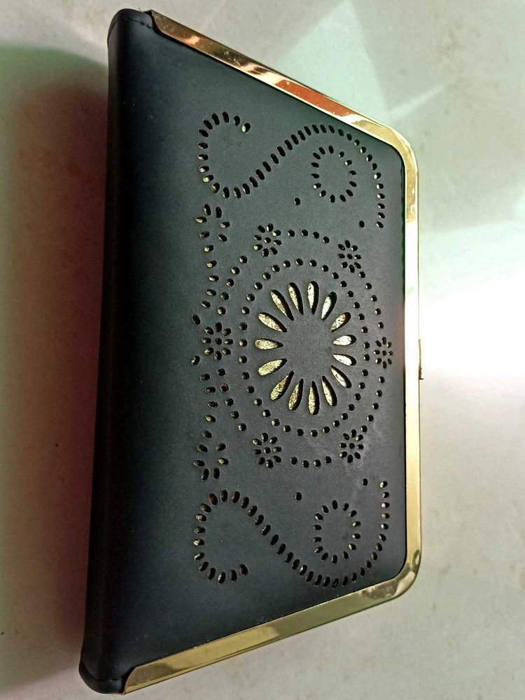 Elegant Black Clutch with Gold Trim
