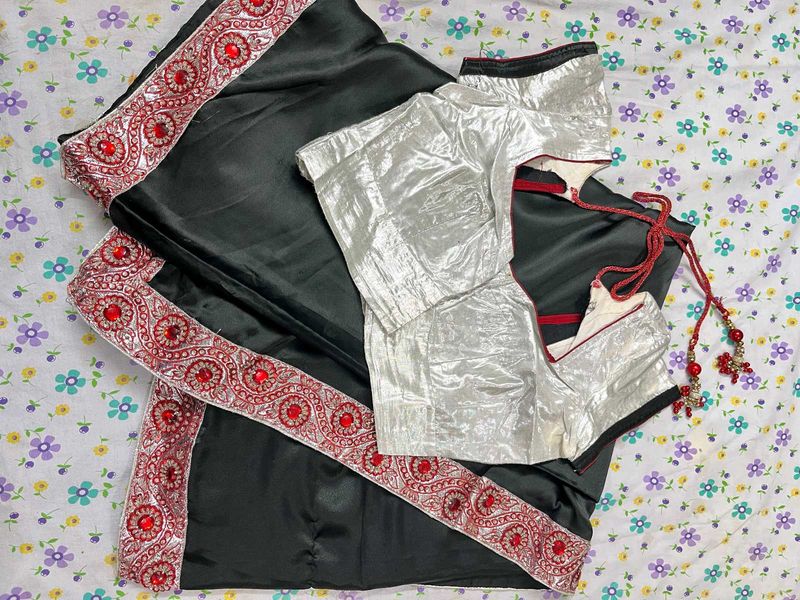 Elegant Black Saree with Red Border