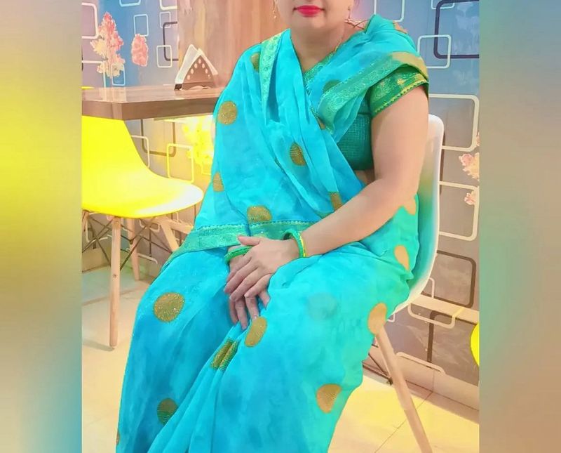 Stunning Teal Blue Saree with Gold Accents