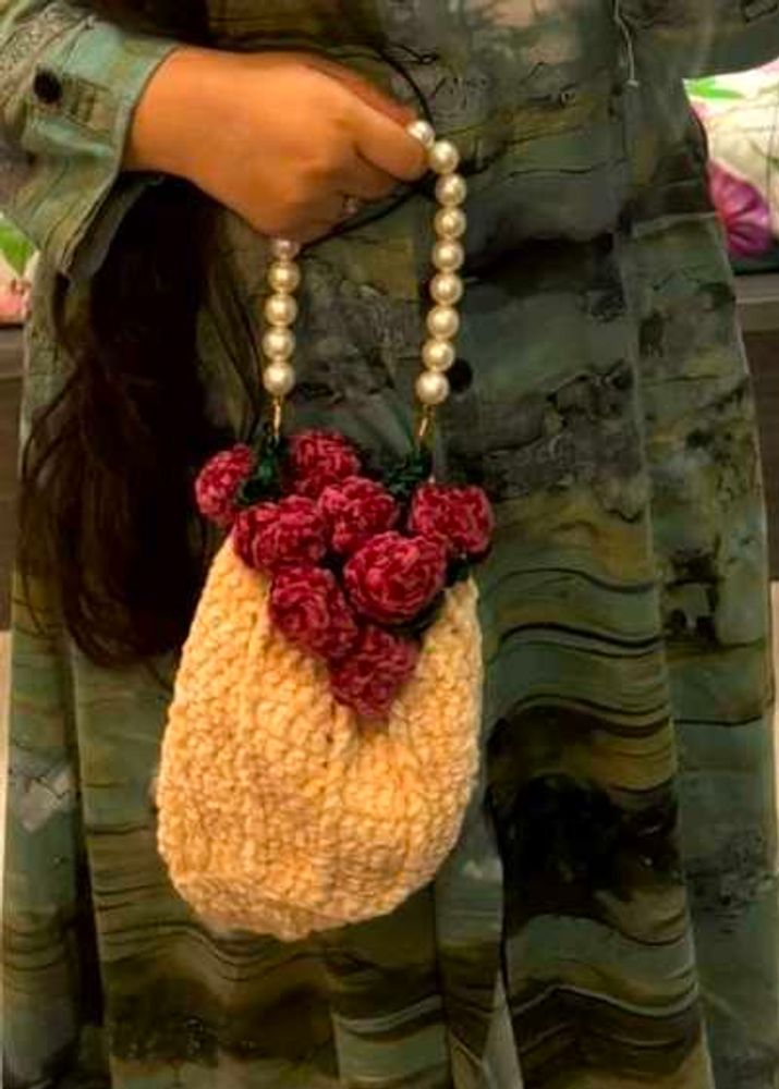 Unique Beaded Handle Clutch with Floral Accent