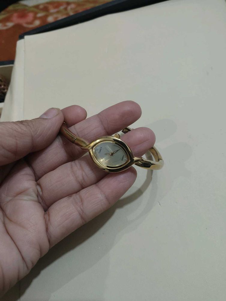 Elegant Gold Bangle Watch