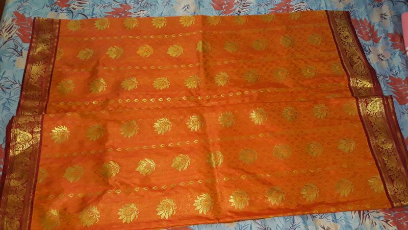 Orange Saree with Gold Motifs
