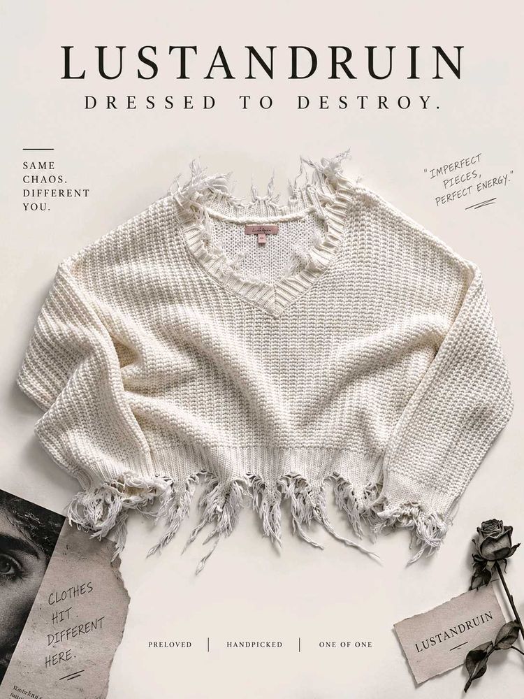 DISTRESSED V-NECK KNIT SWEATER.