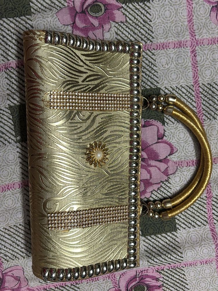 Elegant Gold Clutch Bag with Embellishments