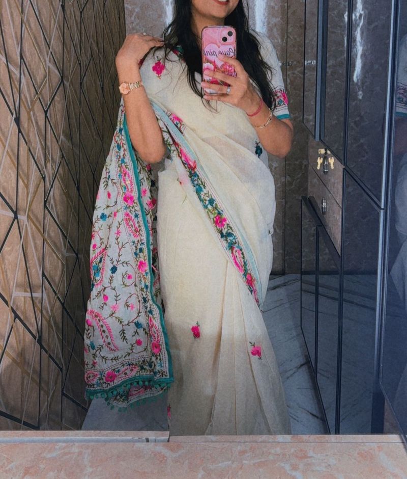Elegant Cream Saree with Floral Embroidery