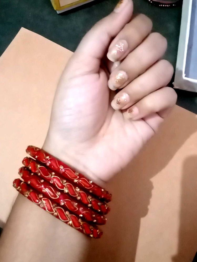 Set of Red Bangles with Gold Detail