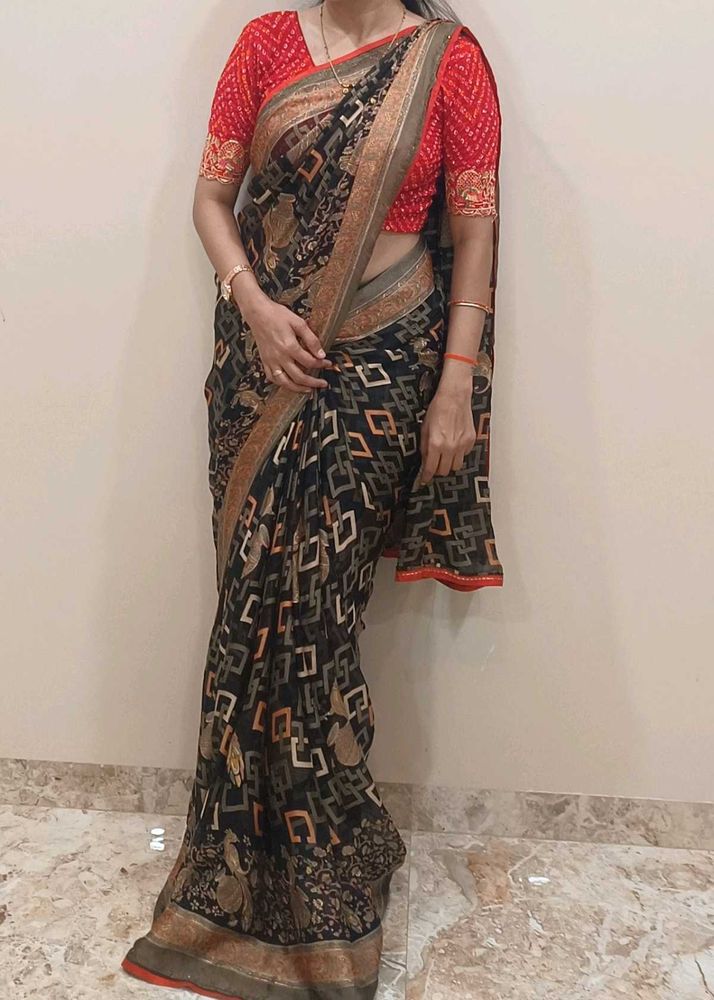 Elegant Printed Black Saree with Red Blouse