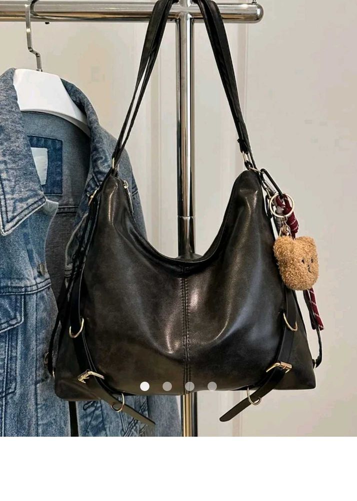 adjustable buckle shoulder bag