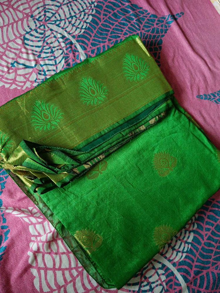Vibrant Green Silk Saree with Gold Motifs