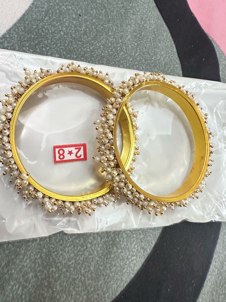 sukkhi women kada-stacks gold bangles