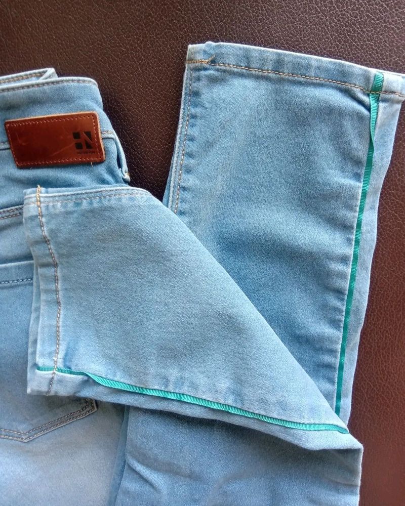 Light Wash Jeans with Green Stripe