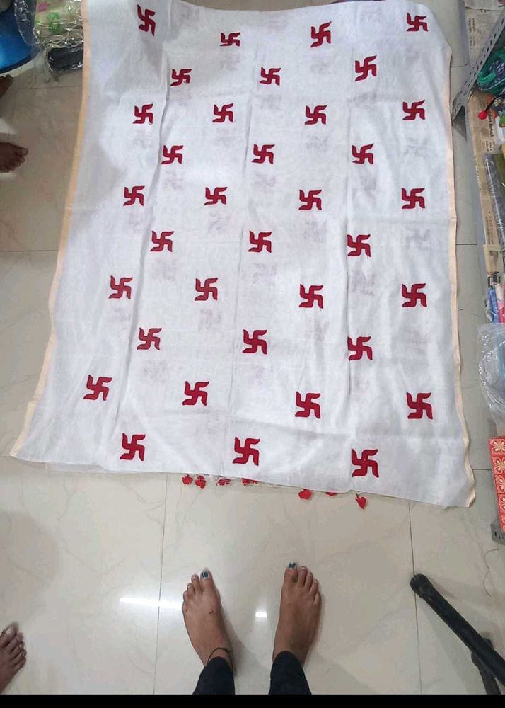 White saree with Red Swastik Print