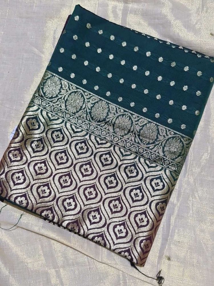 Elegant Teal Silk Saree with Silver Weave