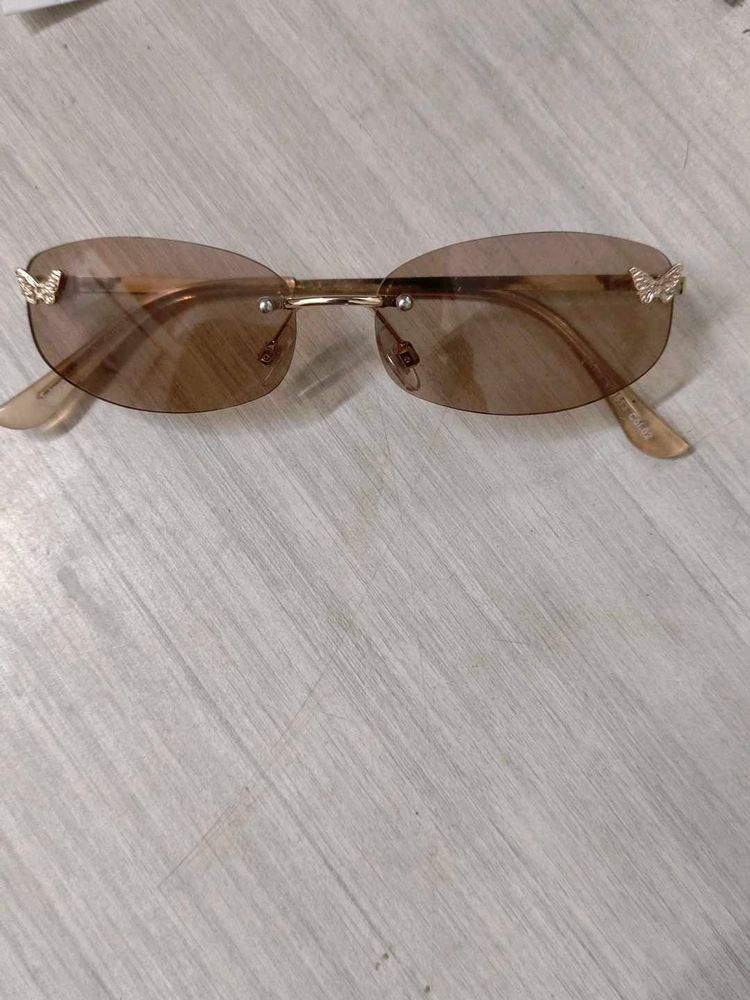 Imported Chic Rimless Butterfly Sunglasses