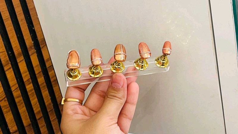 golden and gel design nails