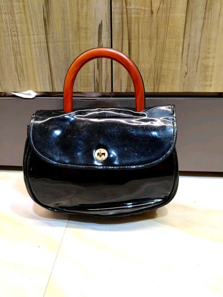 Chic Black Patent Handbag with Wooden Handle