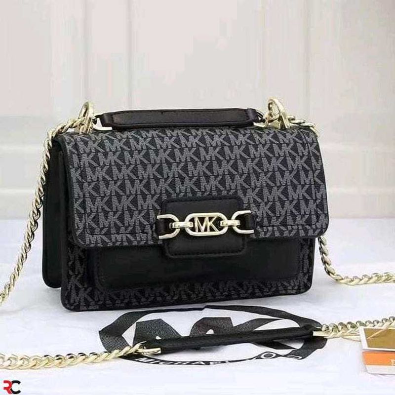 MICHAEL KORS**SIGNATURE LOGO PRINT HEATHER BAG*