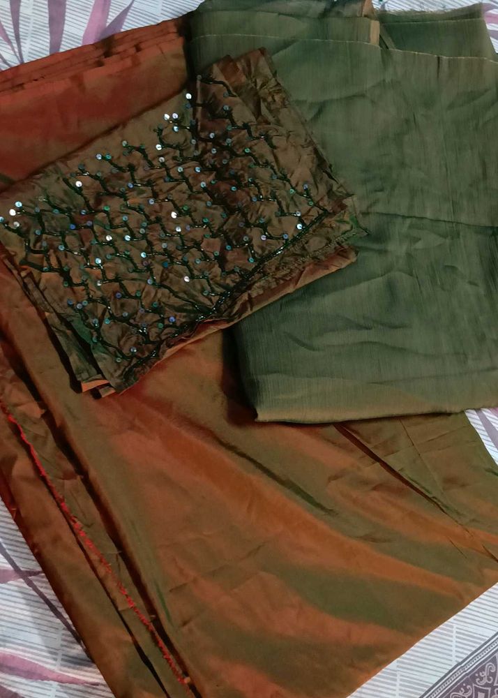 Elegant Silk dress material with Embellished Blous