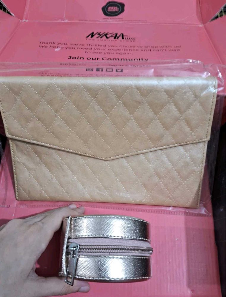 plum golden clutch with Tira trinket box