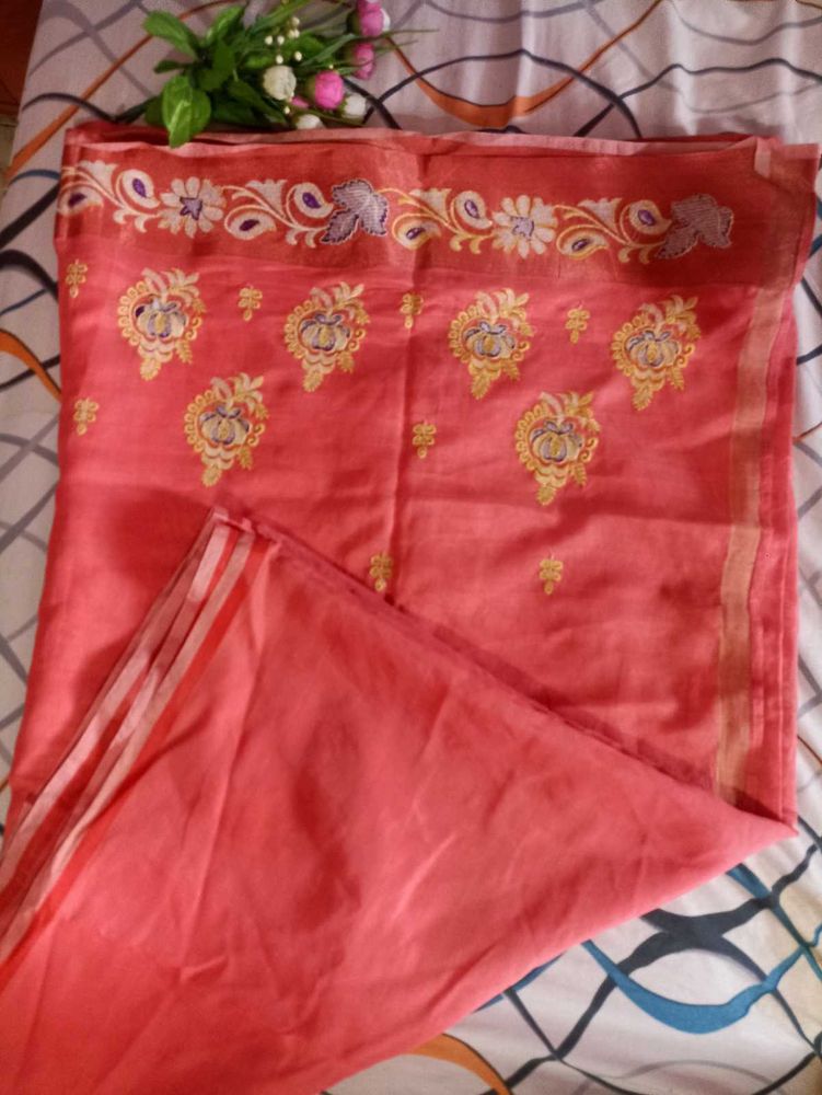 Elegant Coral Saree with Floral Embroidery