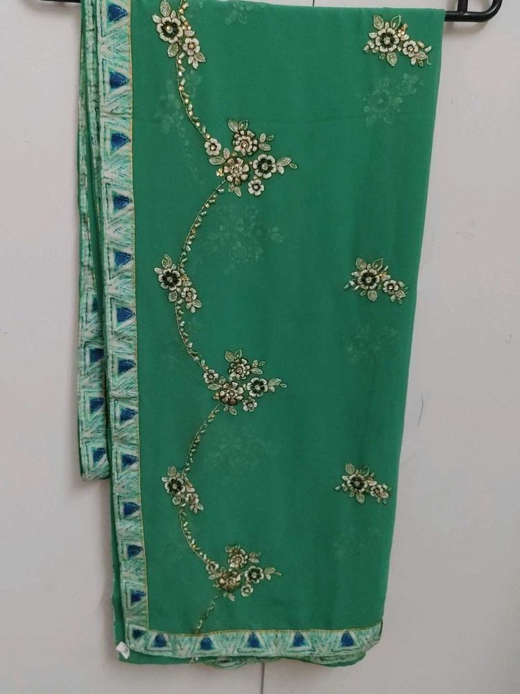 Embellished Green crepe abroided with stone work d