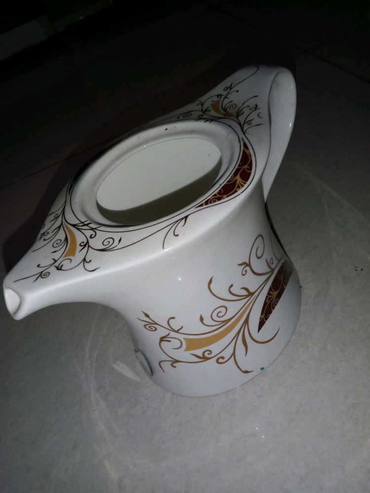 Vintage Gravy Boat with Ornate Design