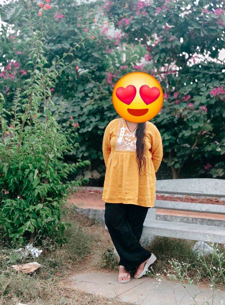 Yellow printed crop top and korian paint combo