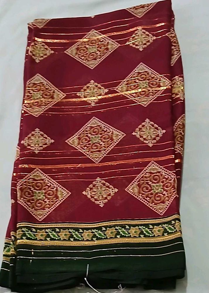 Elegant Maroon Saree with Gold Motifs