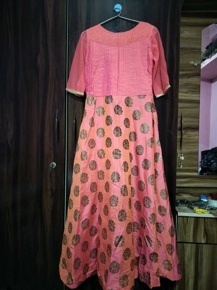 Elegant Coral Gown with Gold Accents