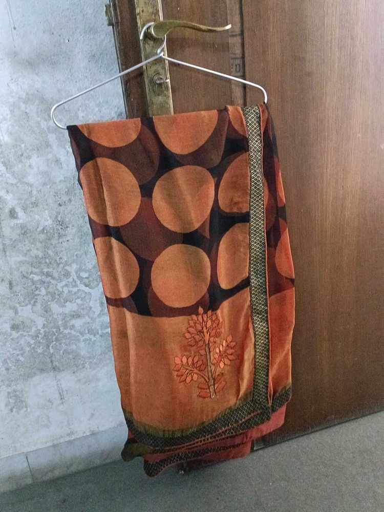 Stylish Orange Saree with Polka Dots