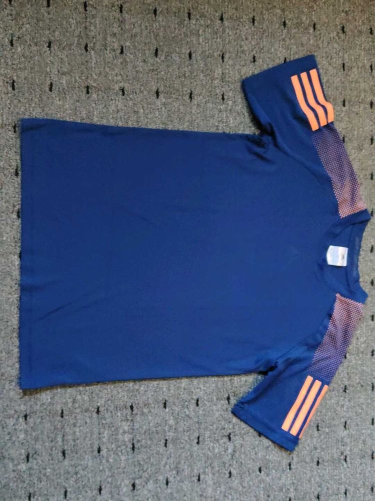 Adidas Blue T-Shirt with Orange Stripes