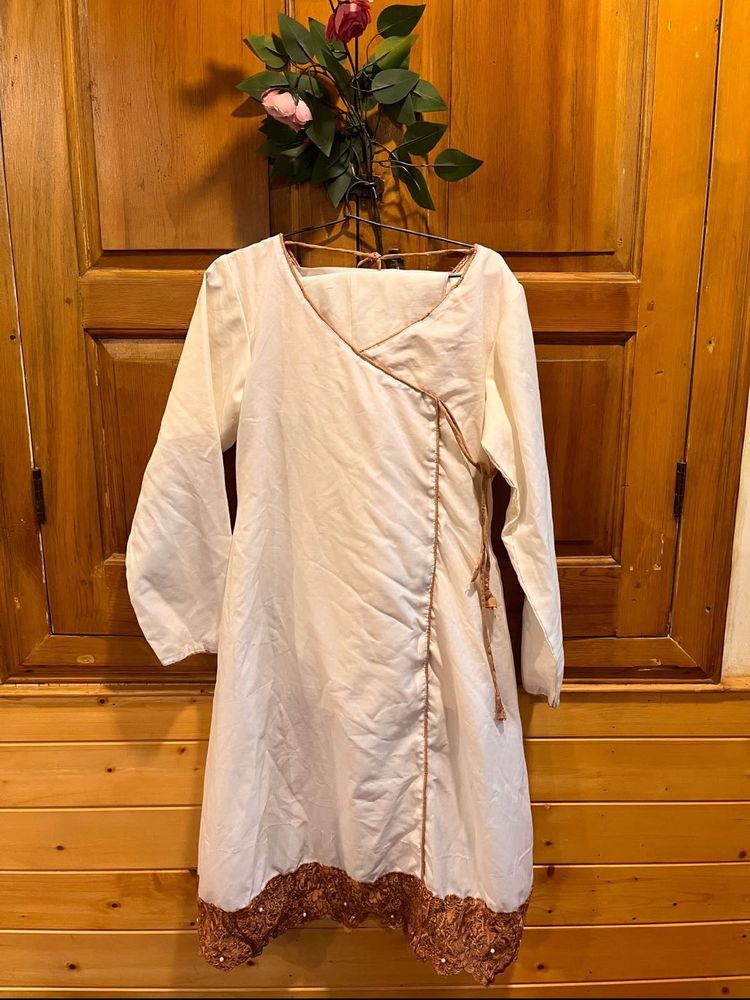 Elegant Cream Kurta with Embroidered Hem