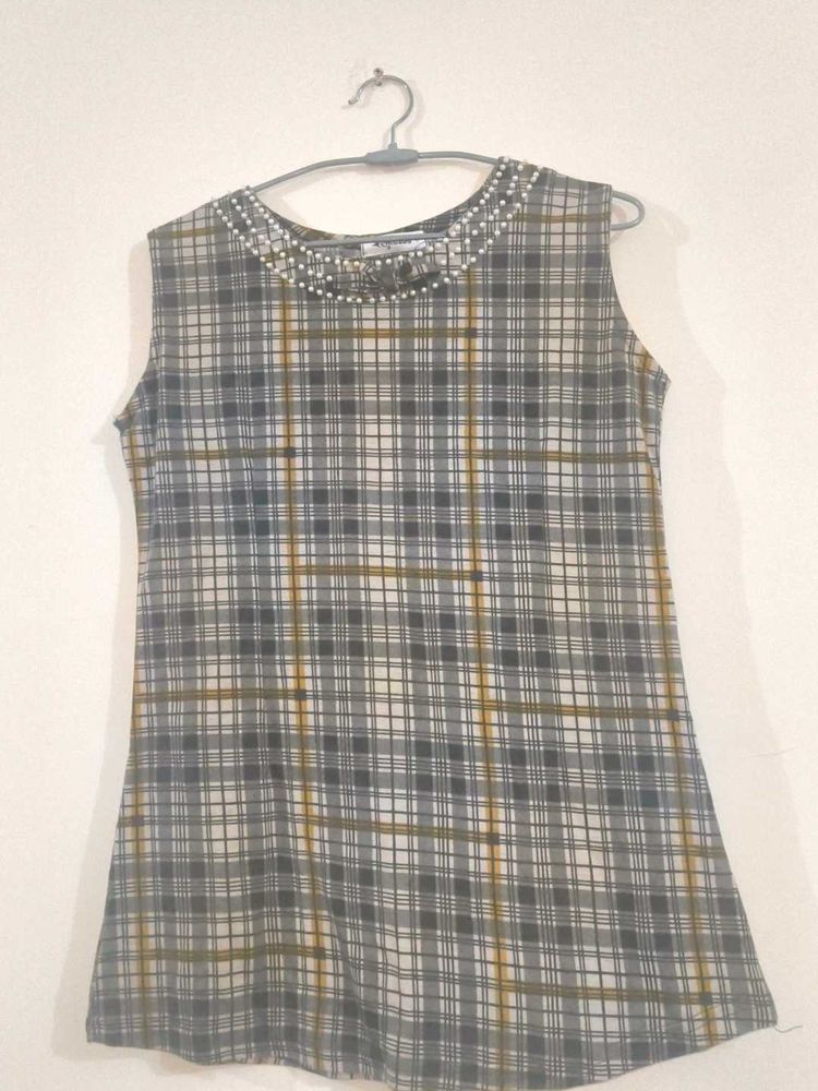 Chic Plaid Tunic with Embellished Neckline
