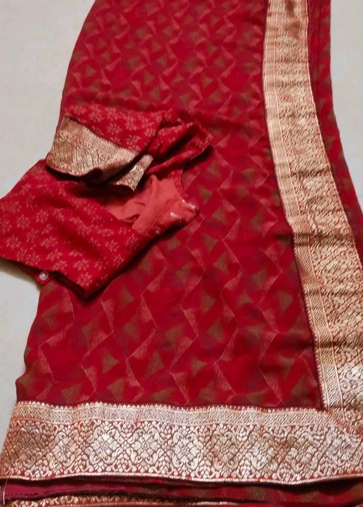 Elegant Red Saree with Golden Border