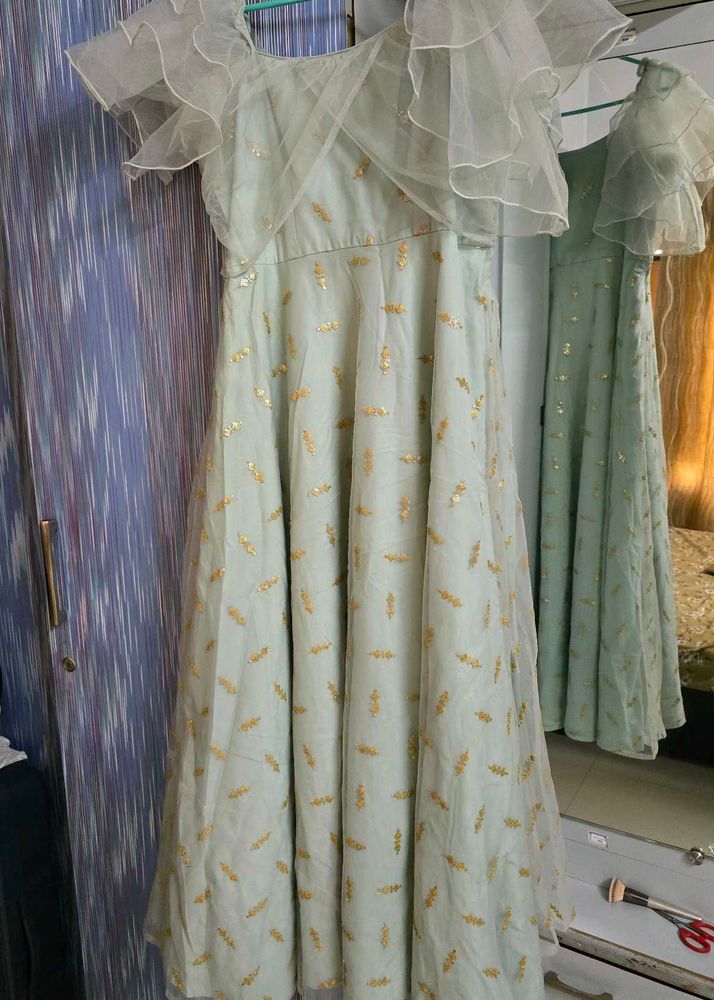 Stunning Festive Light Blue Gown with Gold Motifs