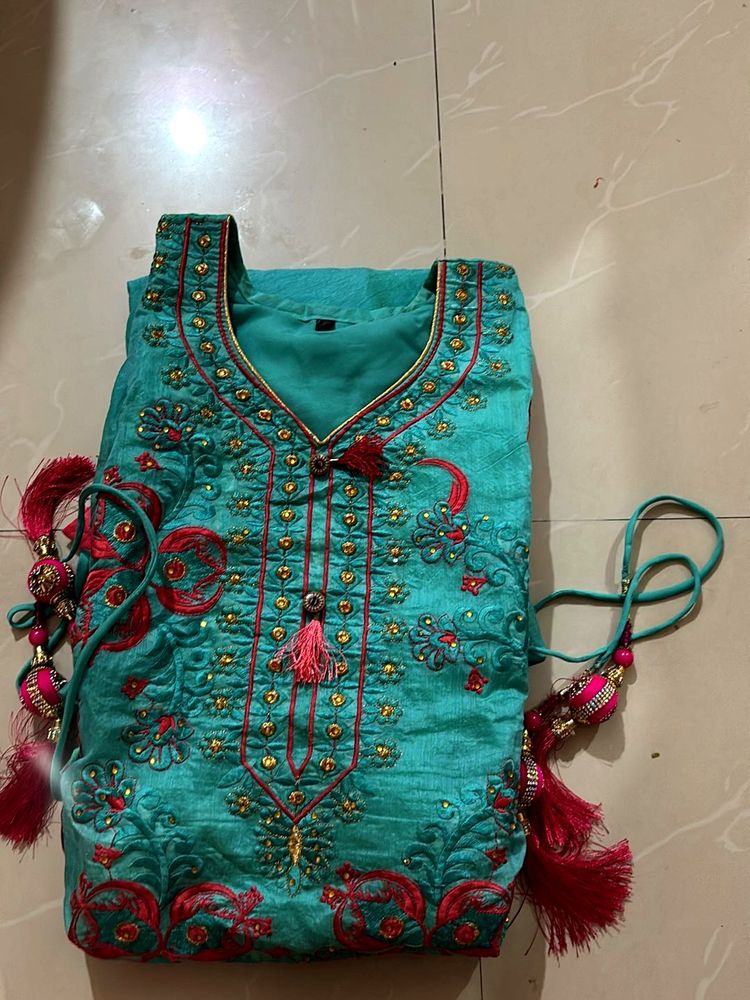 Beautiful Teal Embroidered gown