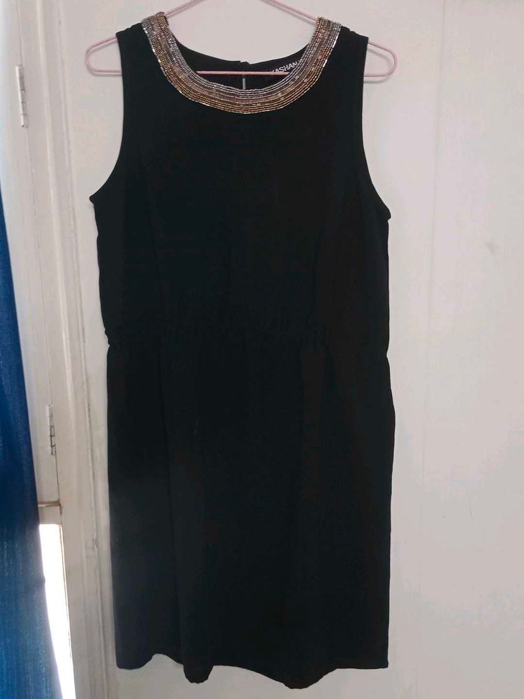 Elegant Black Dress with Embellished Neckline