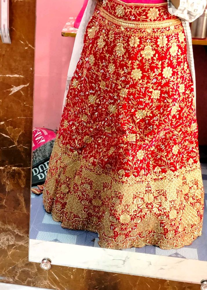 Rani pink Embroidered Lehenga Choli