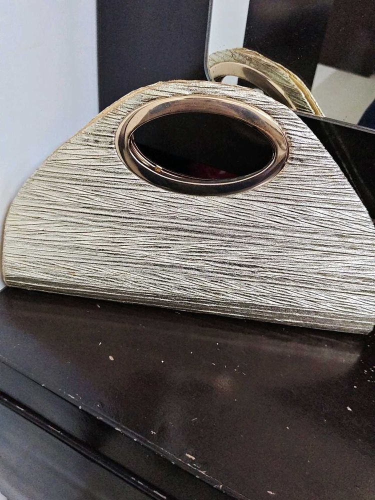 Elegant Textured Clutch Bag golden
