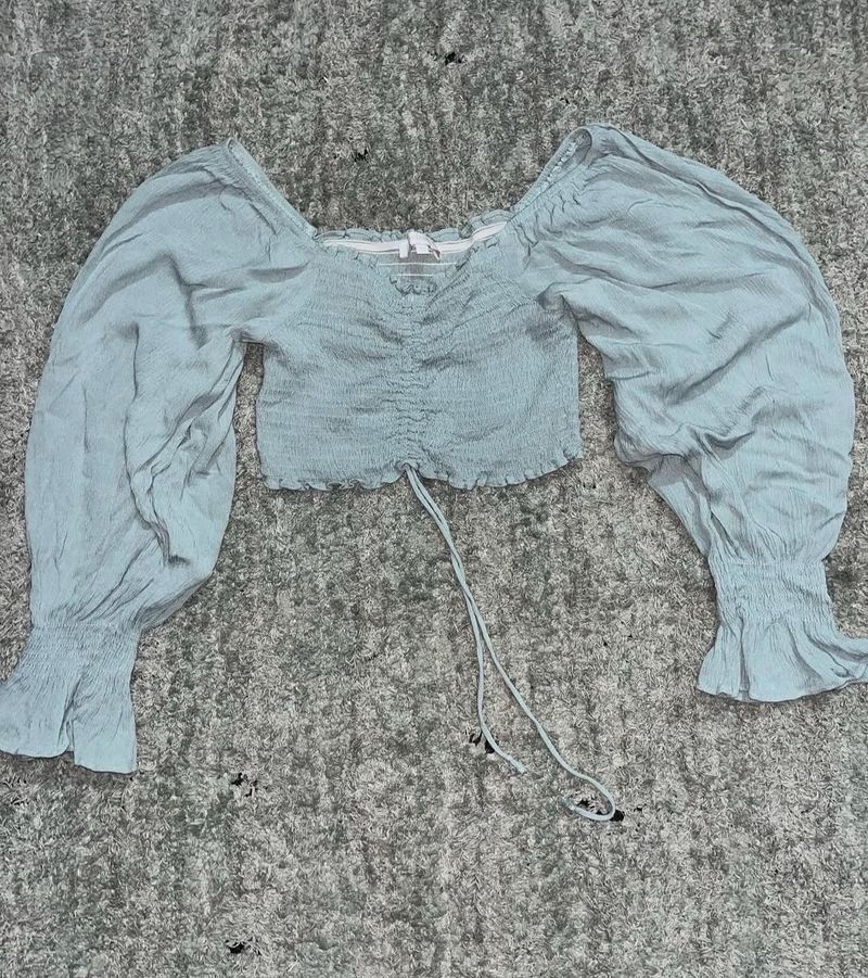 light blue off the shoulder long sleeve crop top